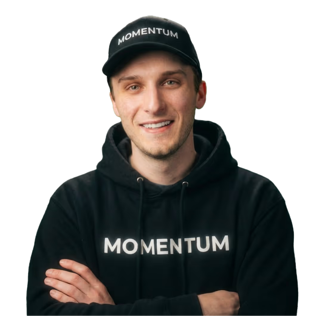 Kevin Cabana in a Momentum cap and hoodie, arms crossed